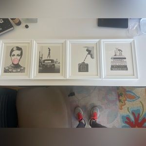 4 8x10 prints, with white wooden frames.